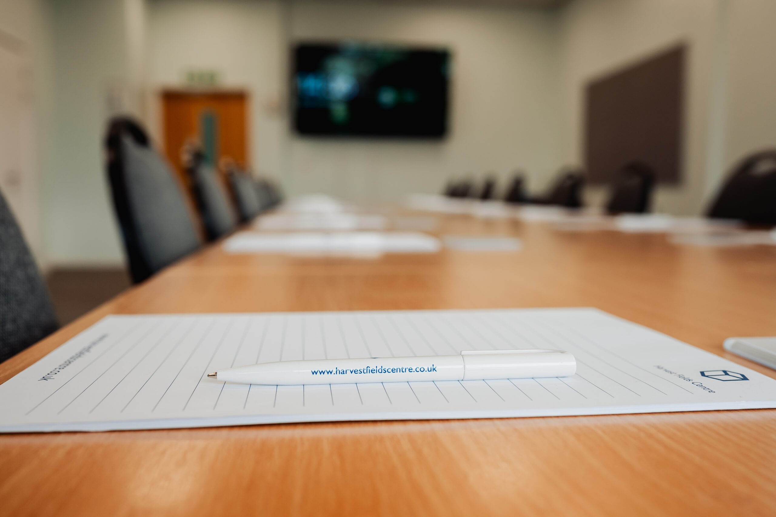 conference-pad-and-pen-long-table-harvest-fields